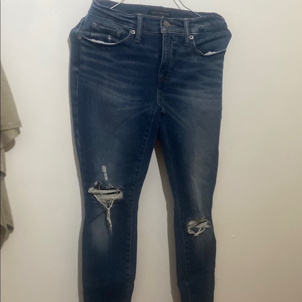 Distressed Blue Jeans